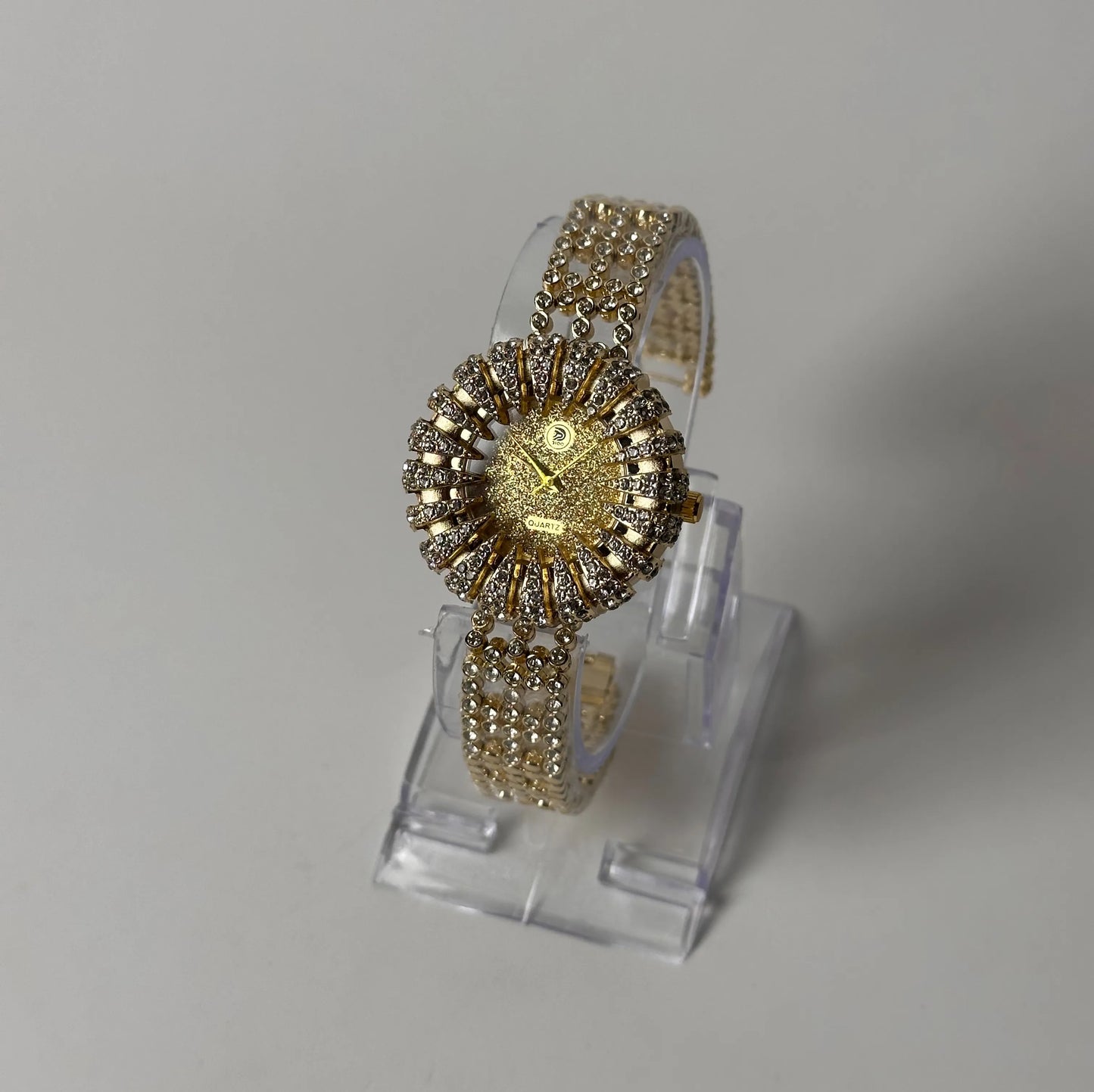Burgi Women’s Gold Sunburst Crystal Watch