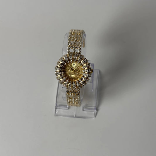 Burgi Womenās Gold Sunburst Crystal Watch